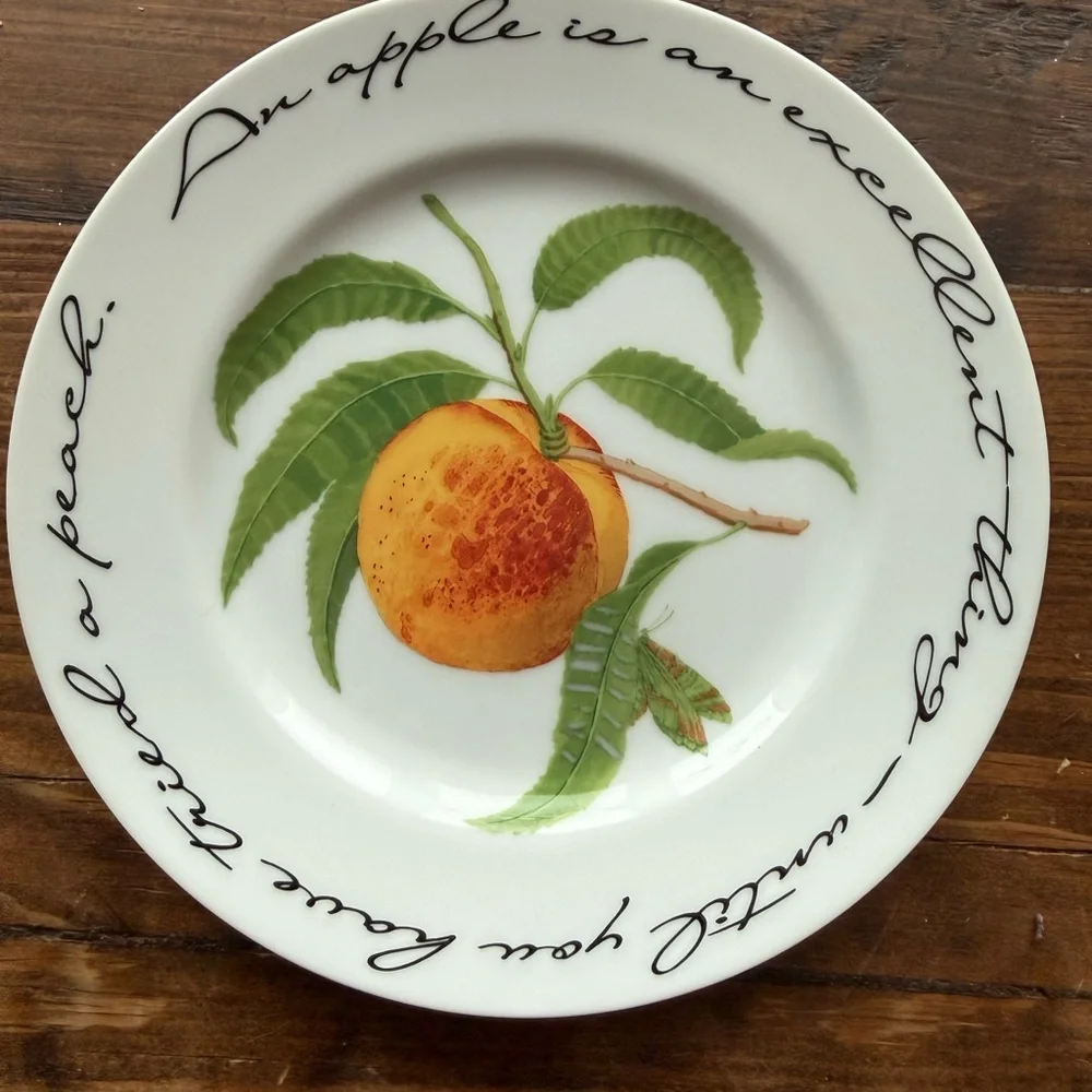 Set of 4 Decorative Wm. Sonoma Plates with different fruit Designs